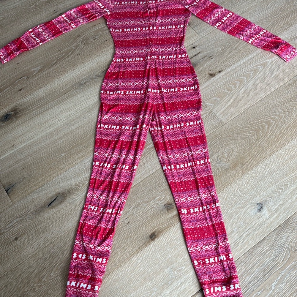 Skims Pink Patterned onesie